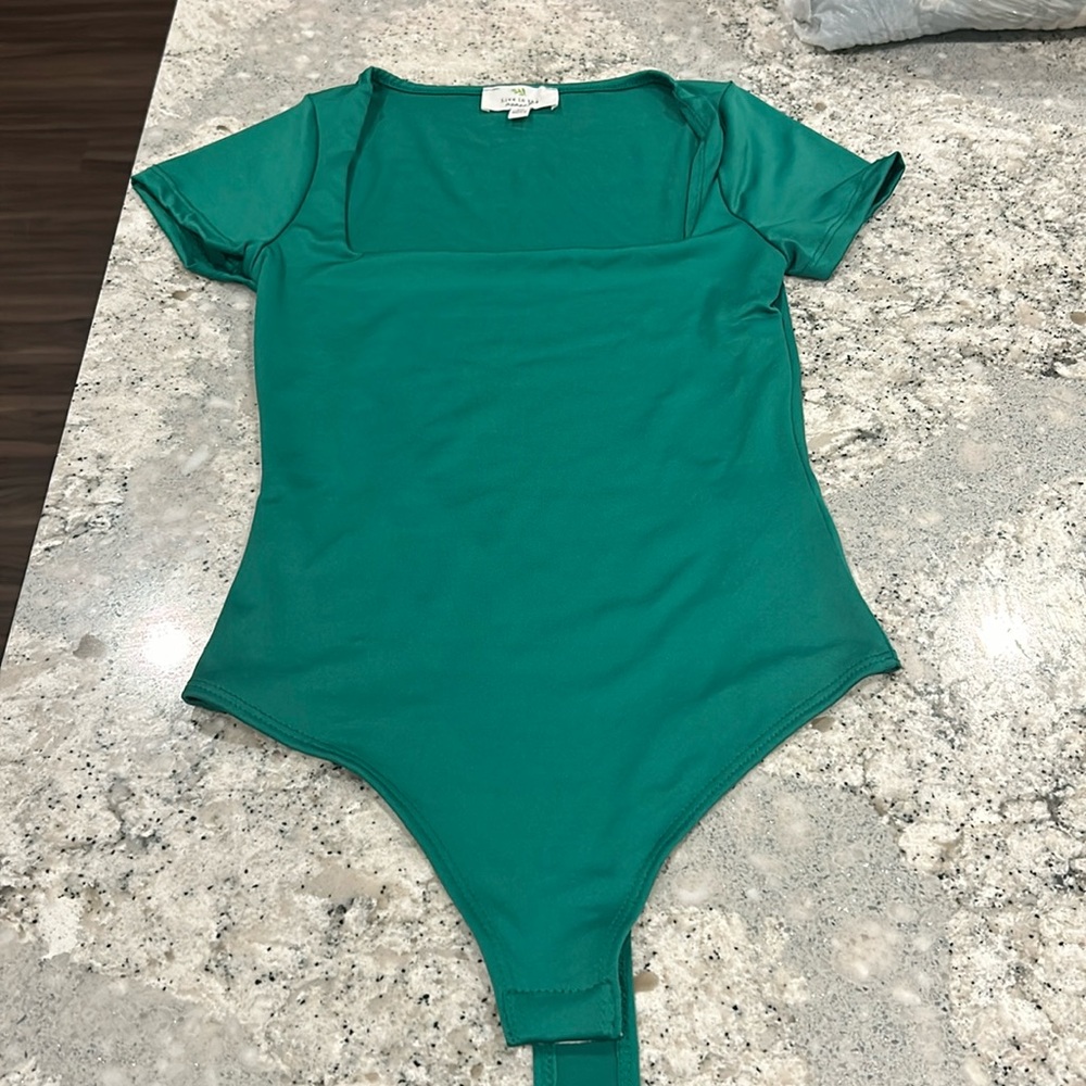 Green body suit